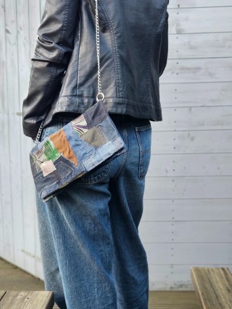 Patchwork Clutch Bag Denim clutch bag worn on shoulder with long strap and soft rectangular shape